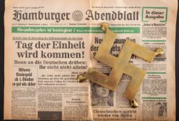 A German WWII period brass trivet, in the form of a swastika,, 16cm wide,