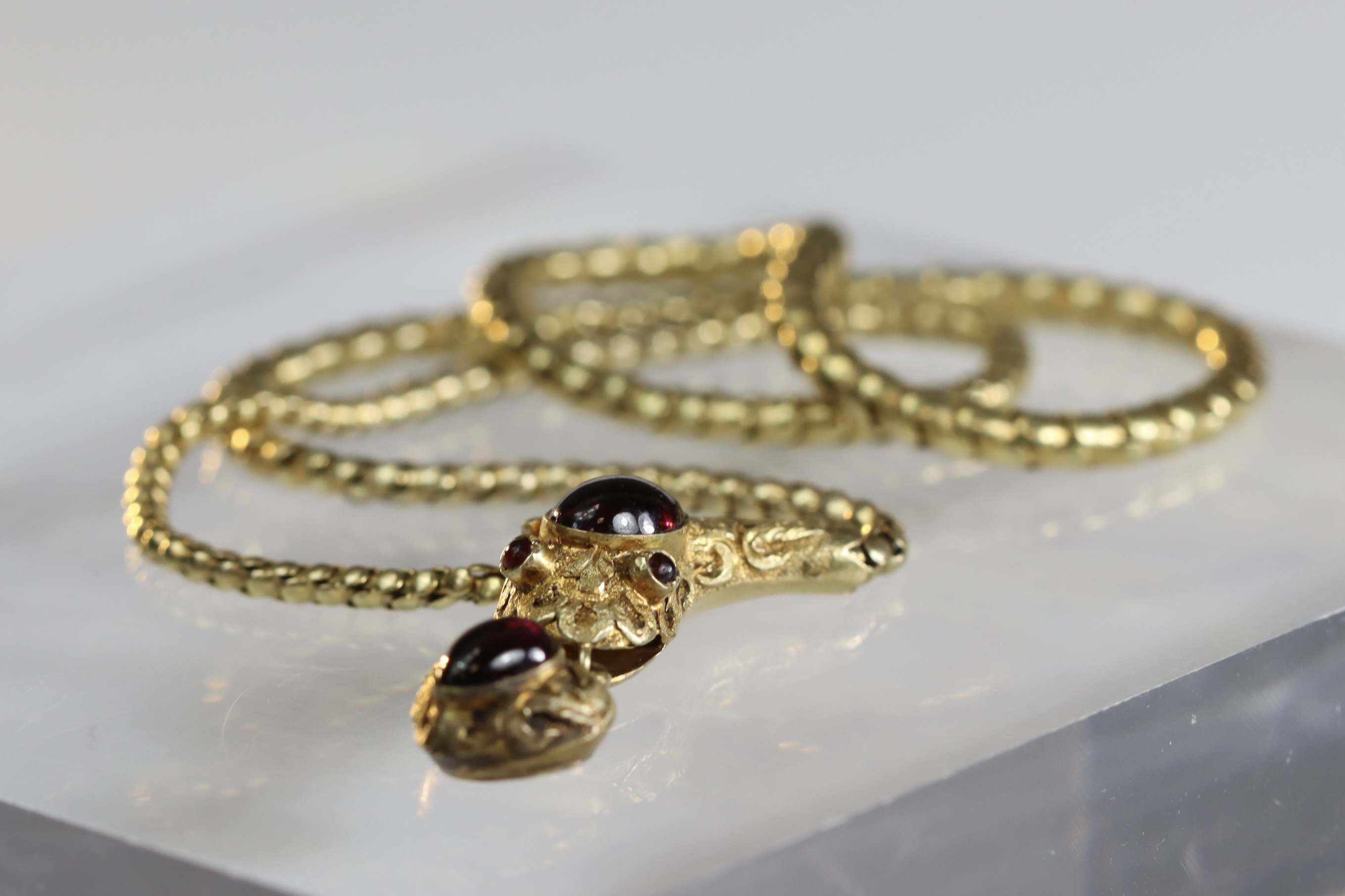 An attractive Antique Cabochon Garnet and Yellow Gold Snake Pendant, circa 1870,the head formed from - Image 7 of 13