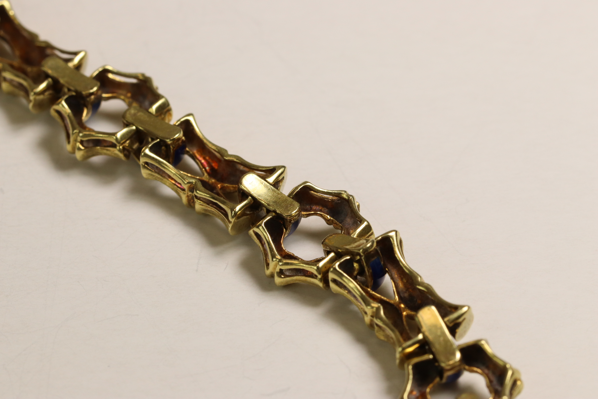 A 1970s 18 Carat Yellow Gold and Enamel Bracelet,Of bamboo design with royal blue enamelled - Image 8 of 11