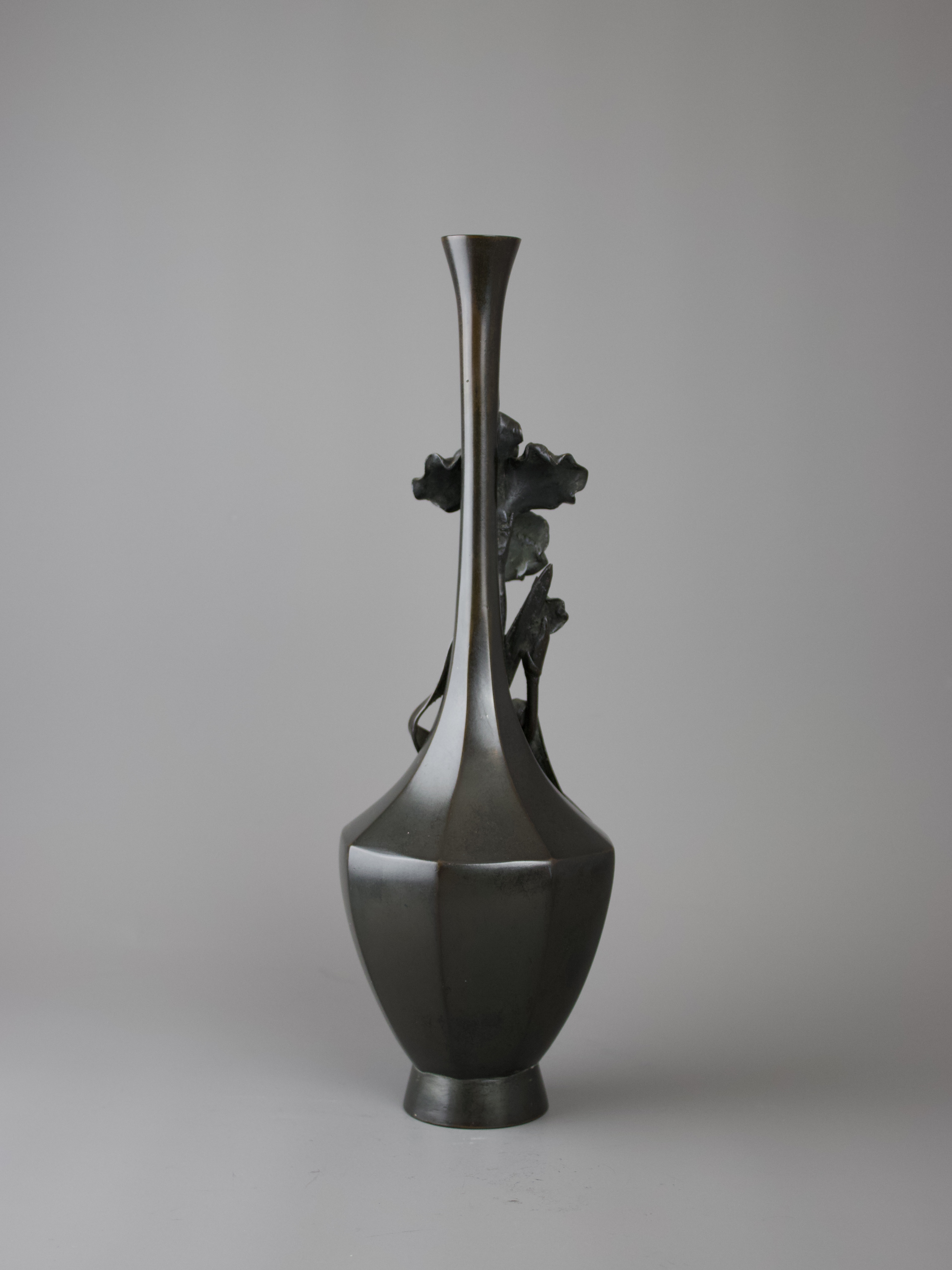 A Japanese Bronze Iris Vase, Meiji periodthe elegant tall bottle vase of hexagonal section with - Image 4 of 7
