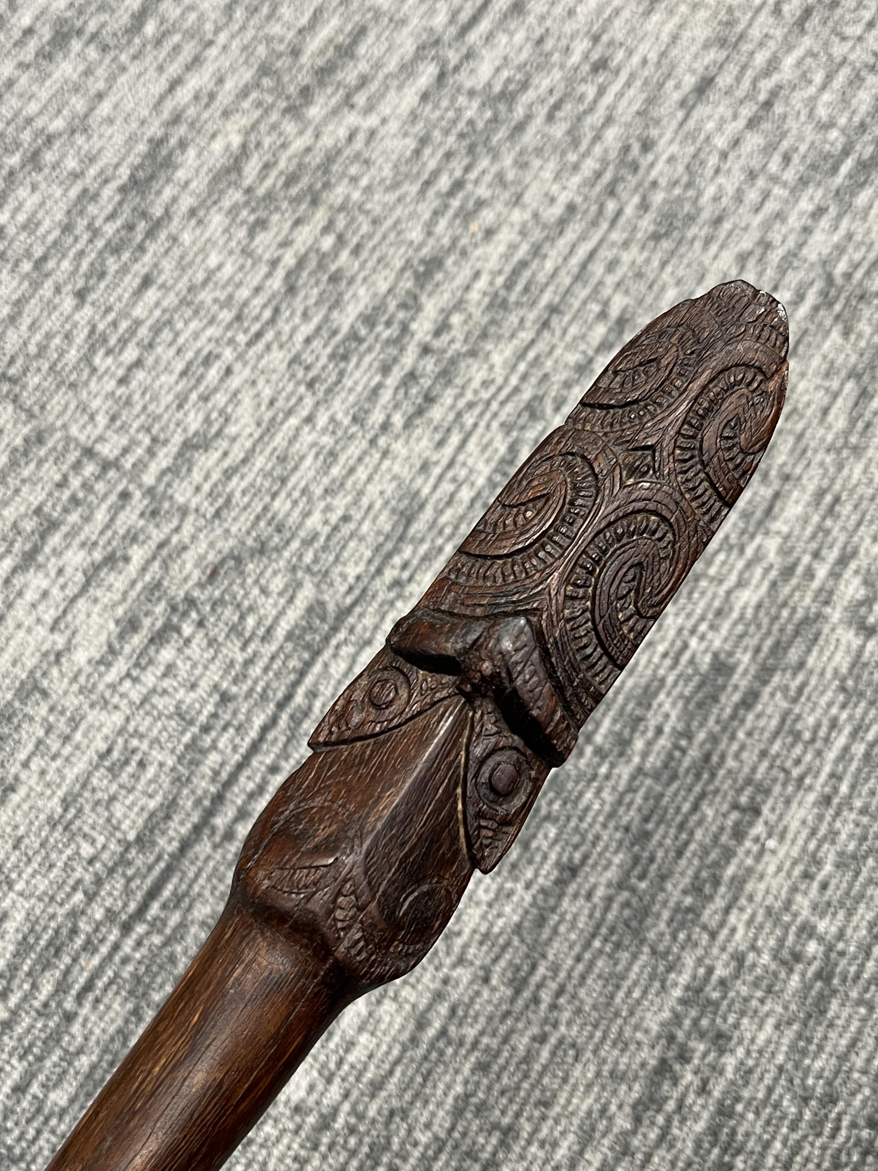 A Maori Taiaha Staff. New Zealand, ca 19th century.Typically carved with two pairs of eyes and - Image 3 of 7