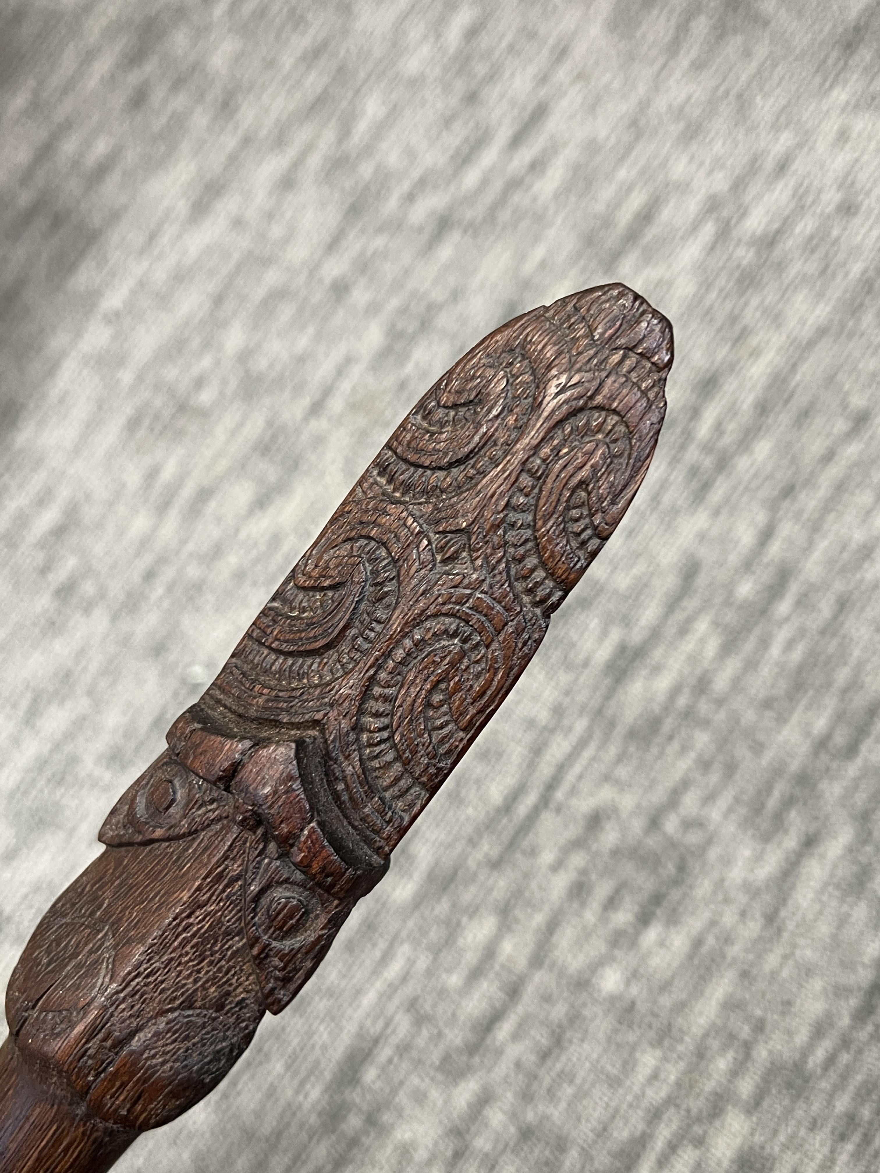 A Maori Taiaha Staff. New Zealand, ca 19th century.Typically carved with two pairs of eyes and - Image 4 of 7