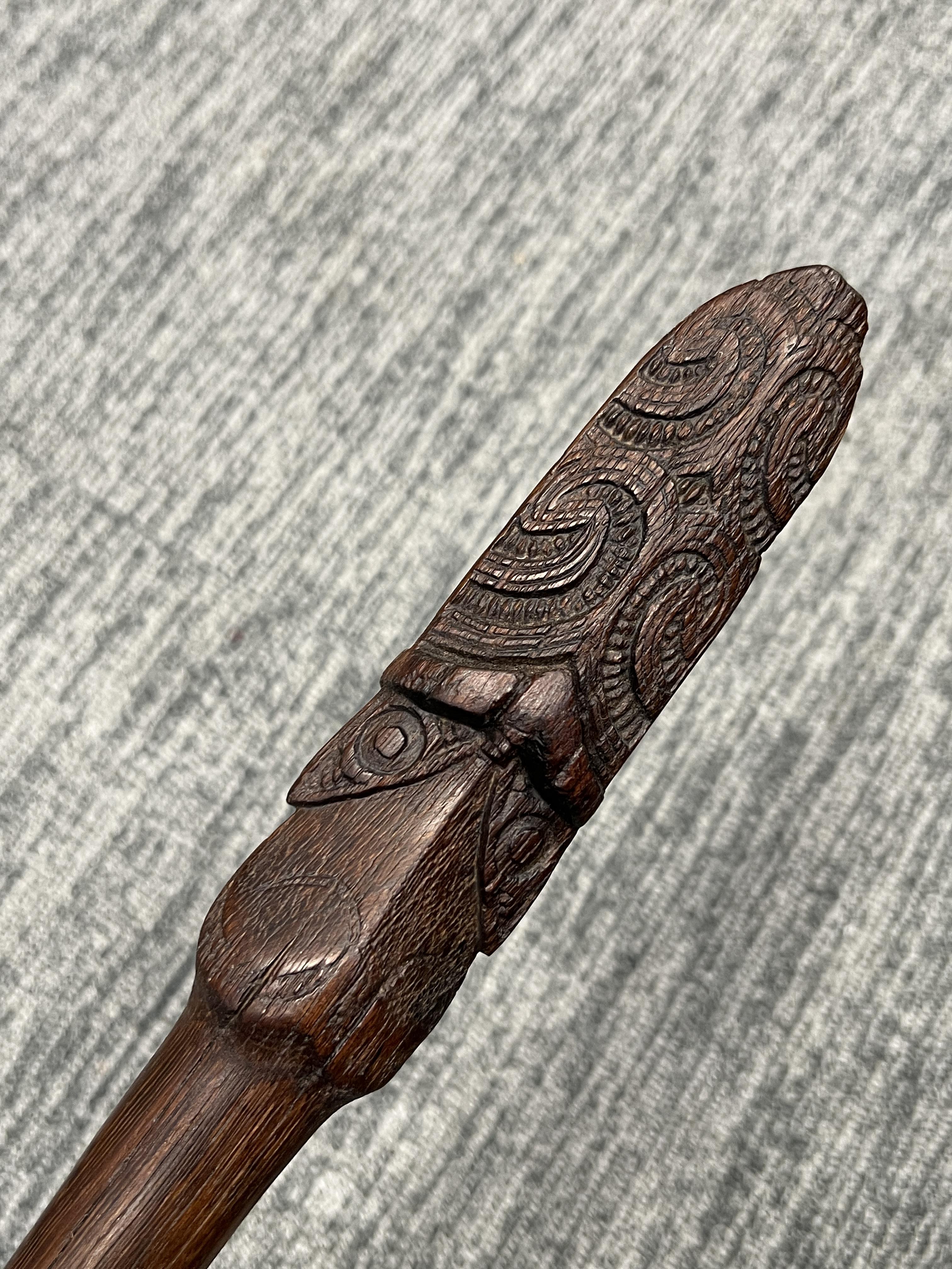 A Maori Taiaha Staff. New Zealand, ca 19th century.Typically carved with two pairs of eyes and - Image 2 of 7