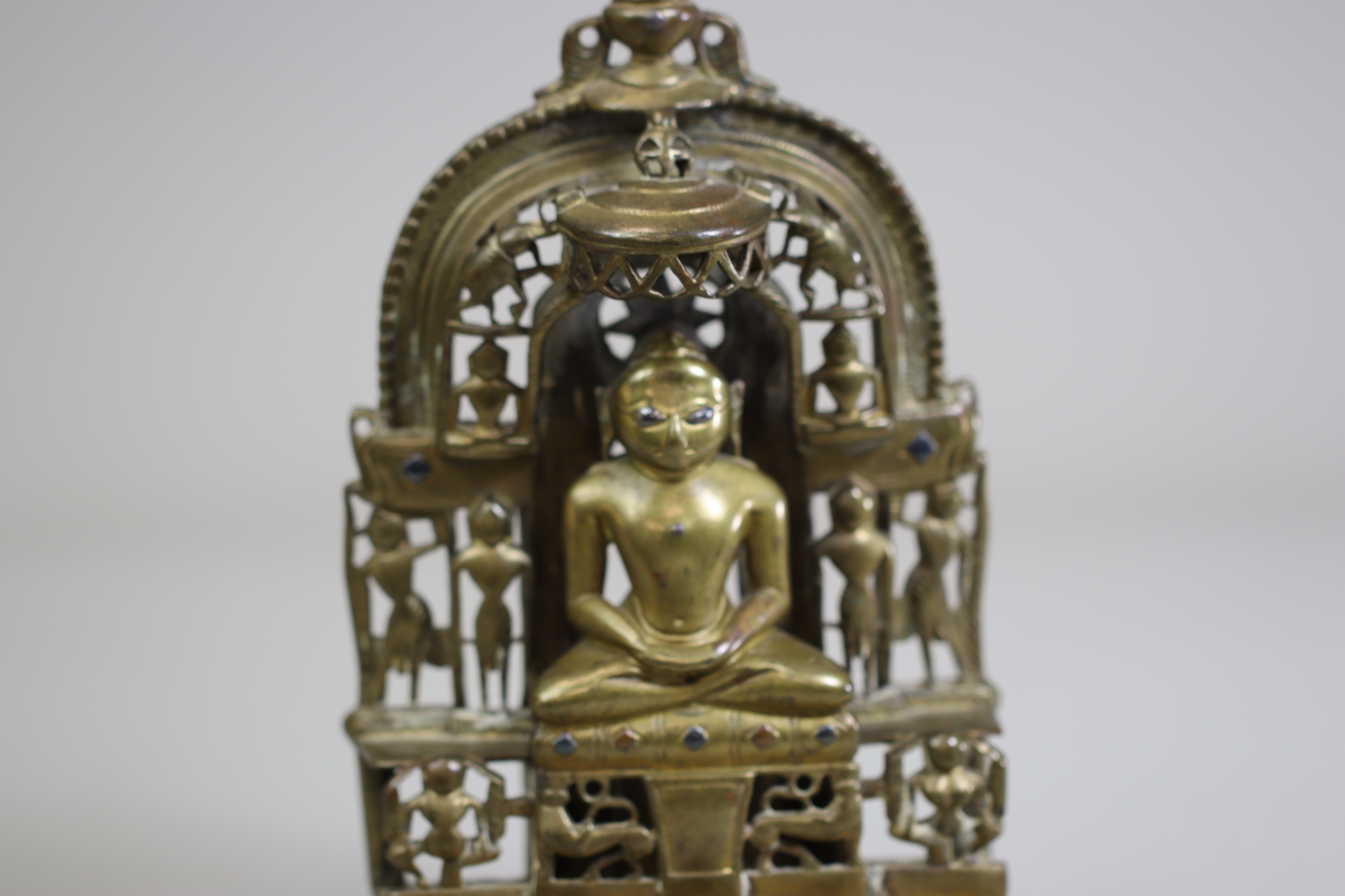 A Bronze Jain shrine. India 15th century.A Jain shrine depicting a Tirthankara with silver inlaid - Image 17 of 18