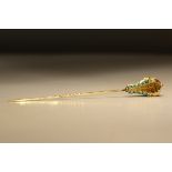 An Antique 18 ct Yellow Gold and Turquoise Stick Pin, circa 1880 The head finely engraved with