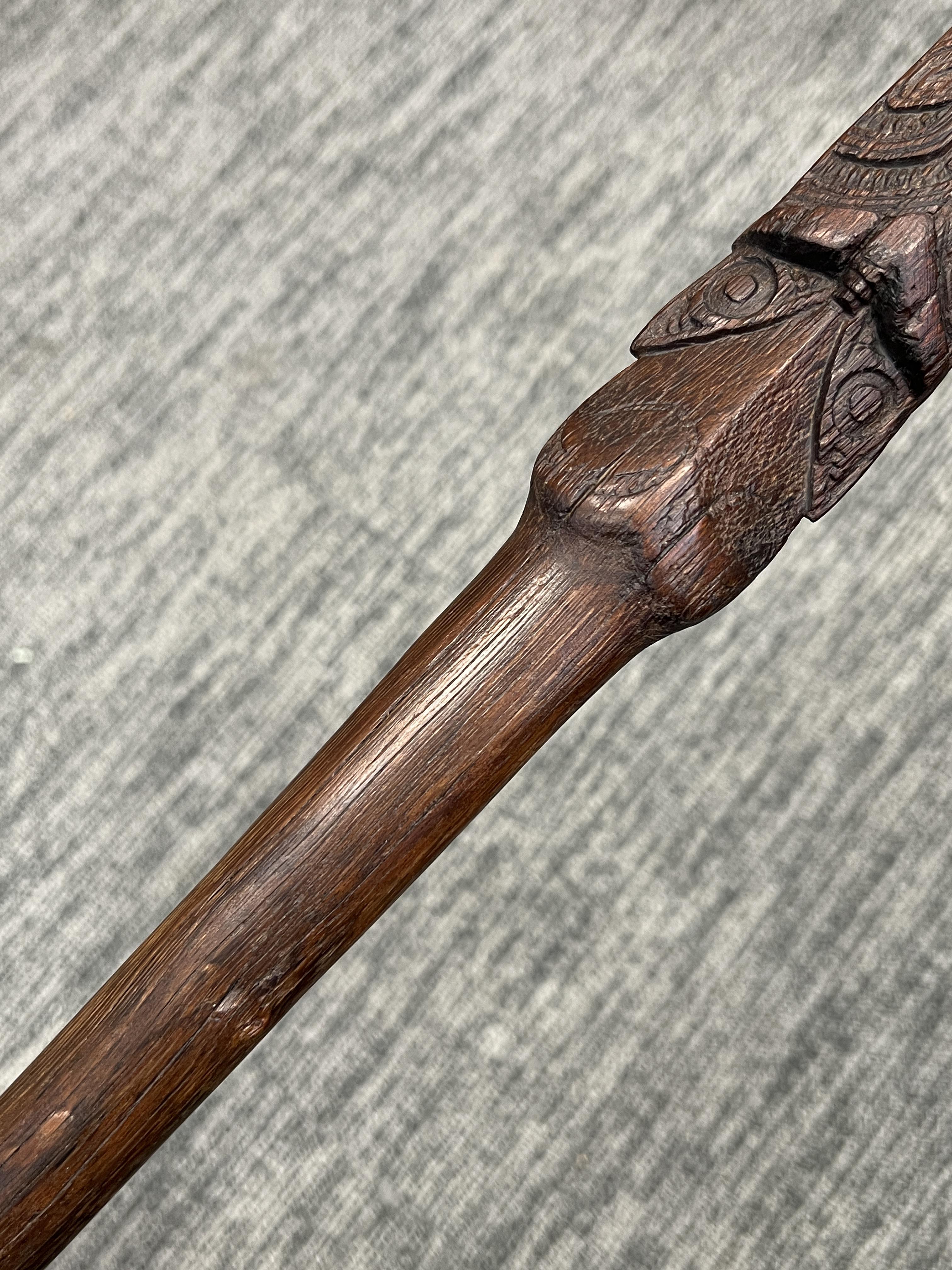 A Maori Taiaha Staff. New Zealand, ca 19th century.Typically carved with two pairs of eyes and - Image 5 of 7