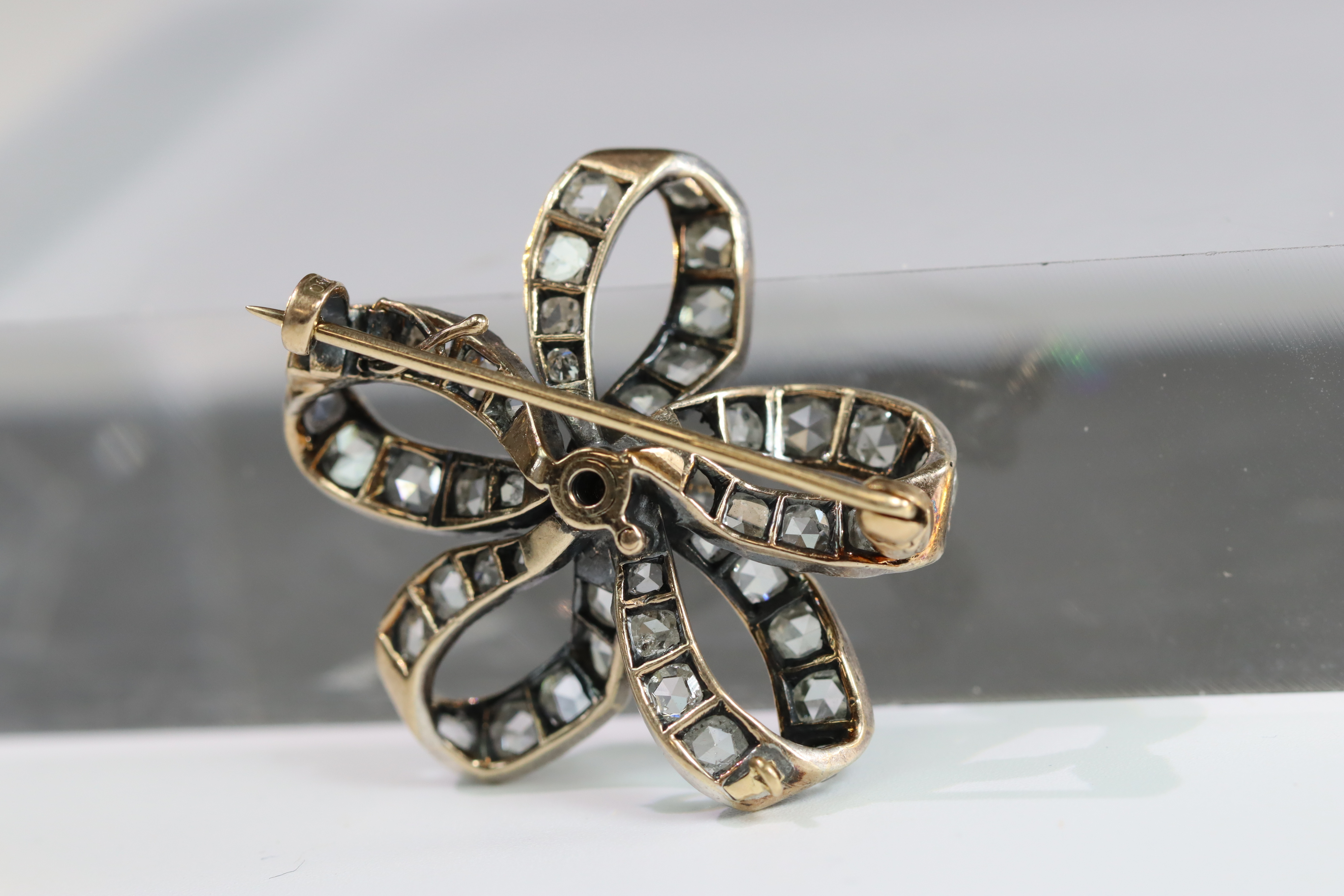 An Antique Diamond and a rose-cut Diamond Stylised Bow Brooch, circa 1890, centrally set with a - Image 5 of 13