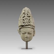 A Fine Stone Carving of Vishnu Head. India, ca: 11th/12th Century.A very fine sandstone finely