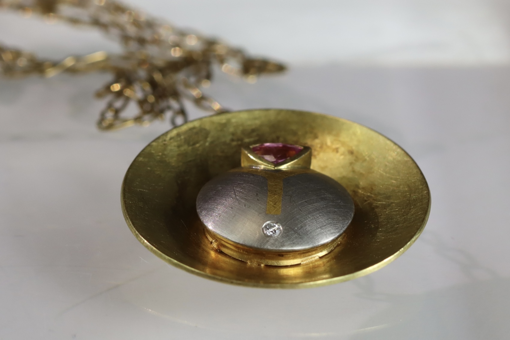 An Unusual Gold, Platinum, Diamond and Ruby Disc Pendant, on a long chain, chain set in 9 ct gold, - Image 8 of 10