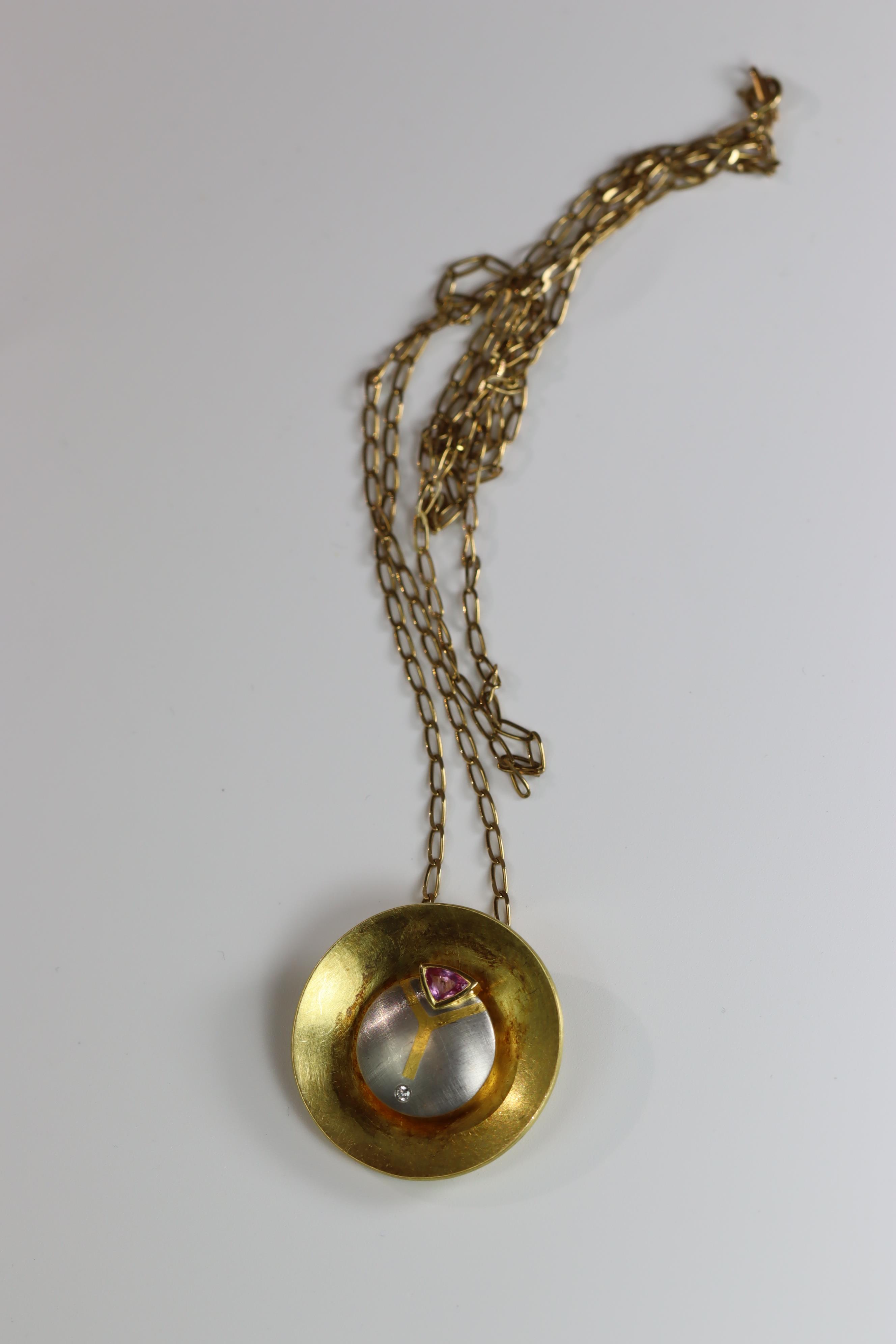 An Unusual Gold, Platinum, Diamond and Ruby Disc Pendant, on a long chain, chain set in 9 ct gold, - Image 6 of 10