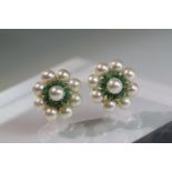 A Pair of Cultured Pearl and Emerald Circular Cluster Earrings each set with a 7.9mm cultured