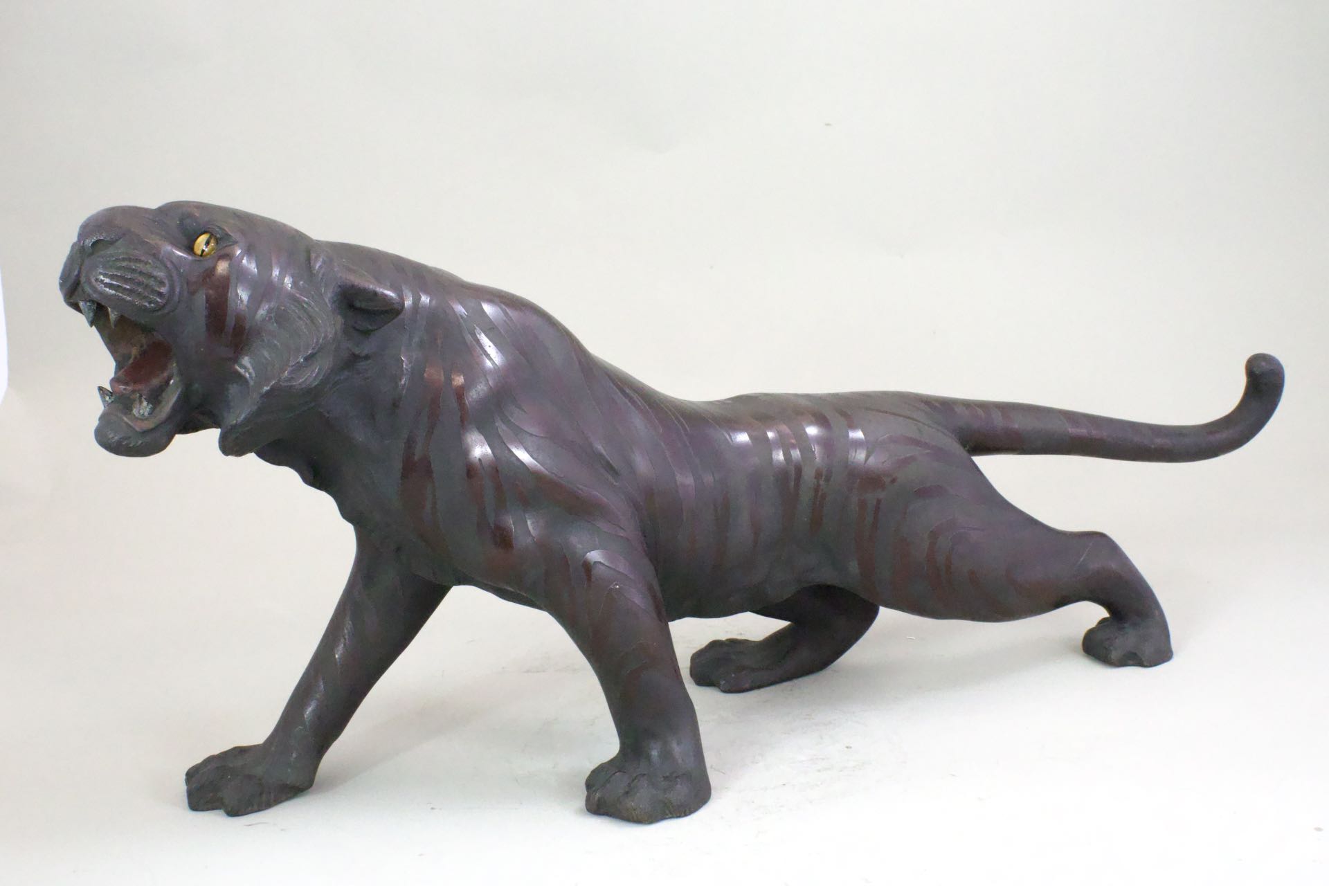 A Japanese Bronze Okimino of Tiger. Meiji Period.with glass eyes, and depicted snarling. Provenance: - Image 6 of 8