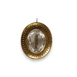 A Victorian 15/18 ct Yellow Gold and Rock Crystal Brooch, circa 1870 The large oval mixed-cut