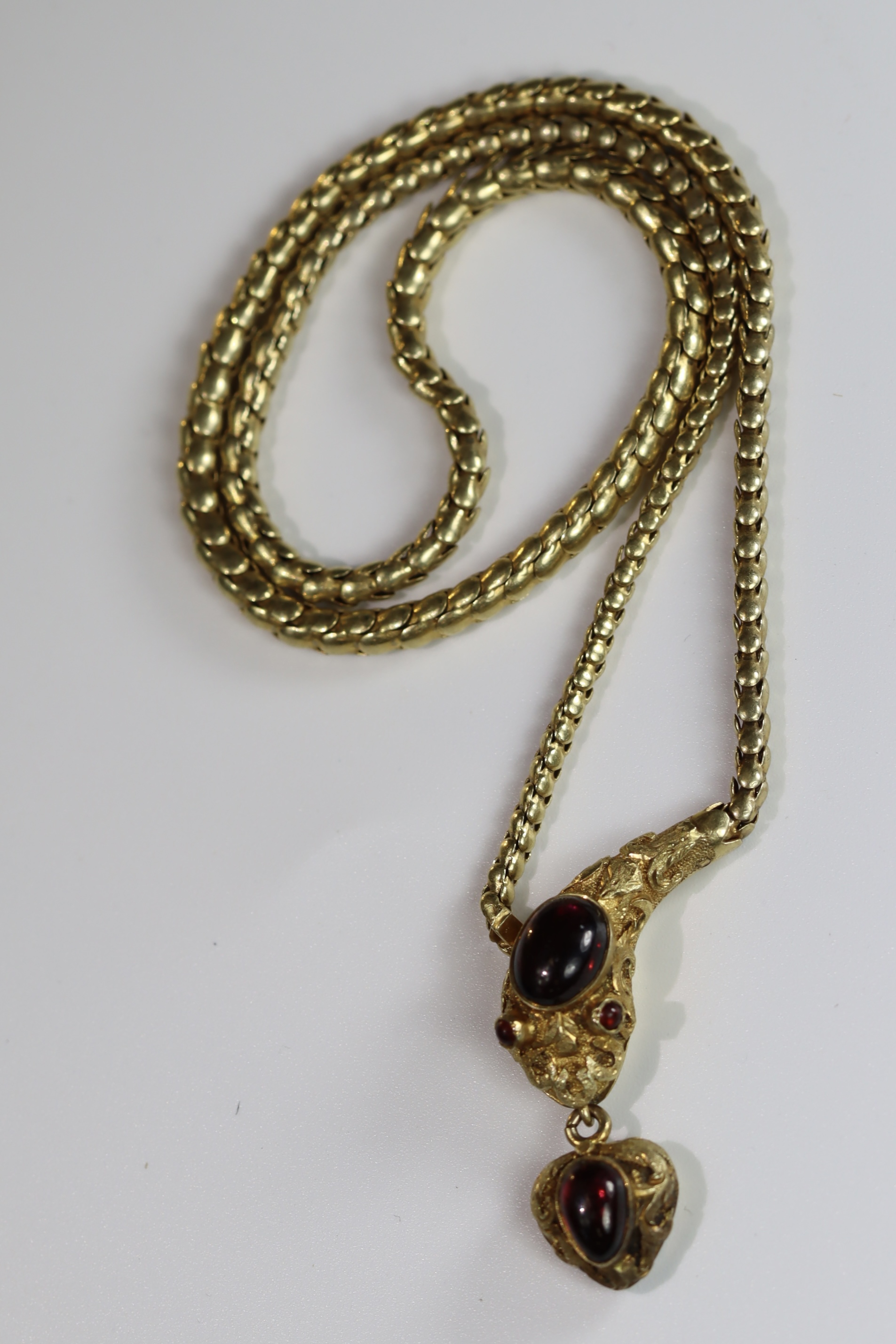 An Attractive Antique Cabochon Garnet and Yellow Gold Snake Pendant, circa 1870,the head formed from - Image 3 of 10
