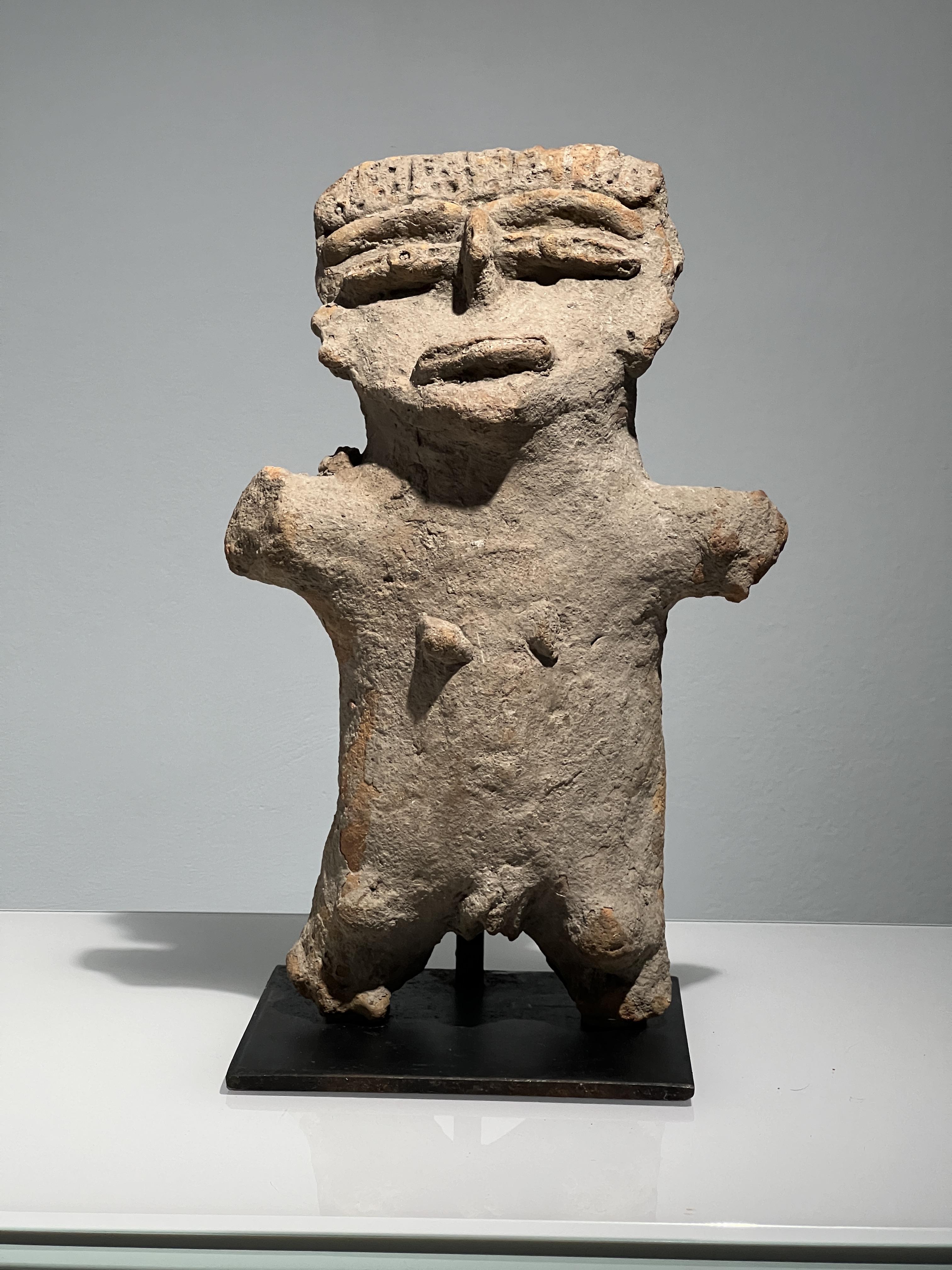 A Mezcala Culture female figure, Mexico, ca. 700-200 BC.Large terracotta figure depicted with