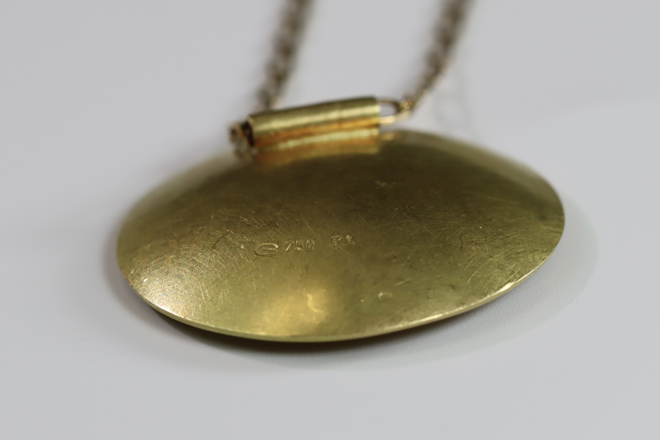 An Unusual Gold, Platinum, Diamond and Ruby Disc Pendant, on a long chain, chain set in 9 ct gold, - Image 9 of 10