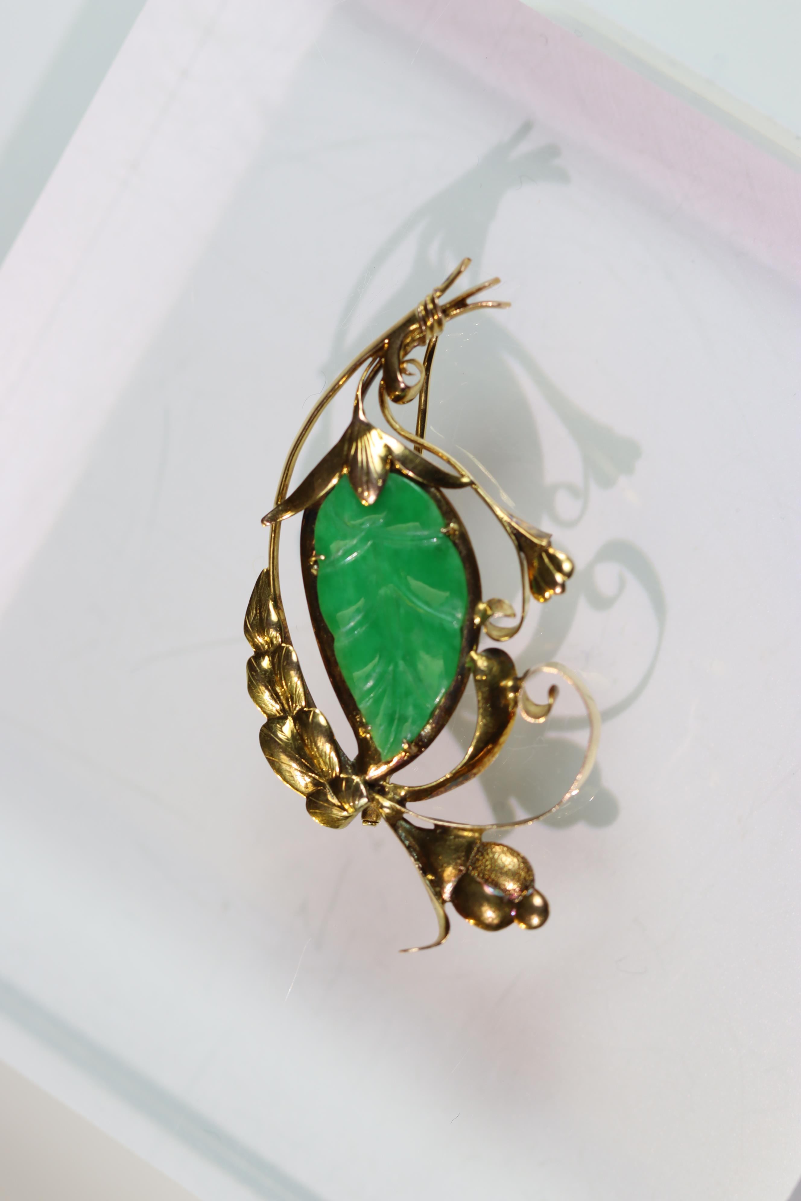 A 1940's Jadeite Brooch the strong apple green coloured jadeite carved as a leaf, with yellow - Image 3 of 7