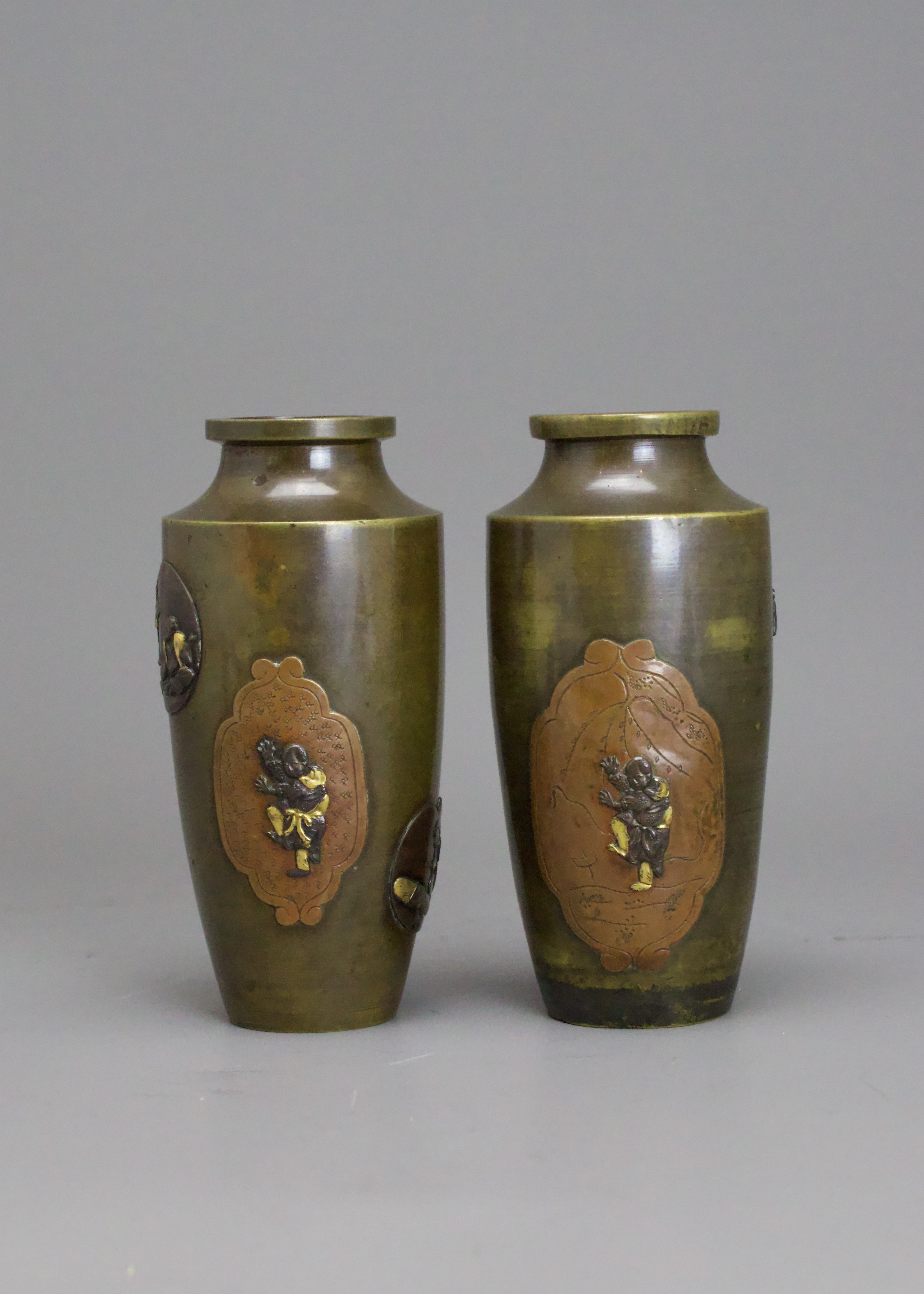 A small Pair of Japanese mixed metal Vases, Meiji periodthe sides decorated in low relief in gilt, - Image 2 of 14