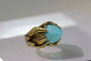 A Turquoise set 18ct gold ring . French gold marks and makers marks on exterior of shank. Signed