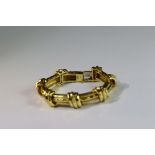 An 18k Hammered Gold Bracelet, by the American jeweller Dunay, circa 1970s.signed Dunay Weightï¼