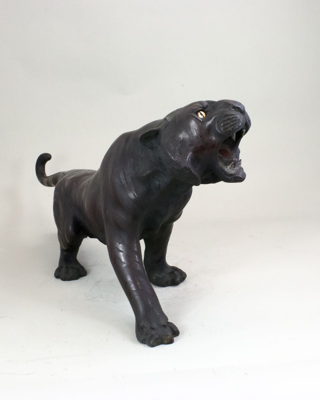 A Japanese Bronze Okimino of Tiger. Meiji Period.with glass eyes, and depicted snarling. Provenance: - Image 7 of 8