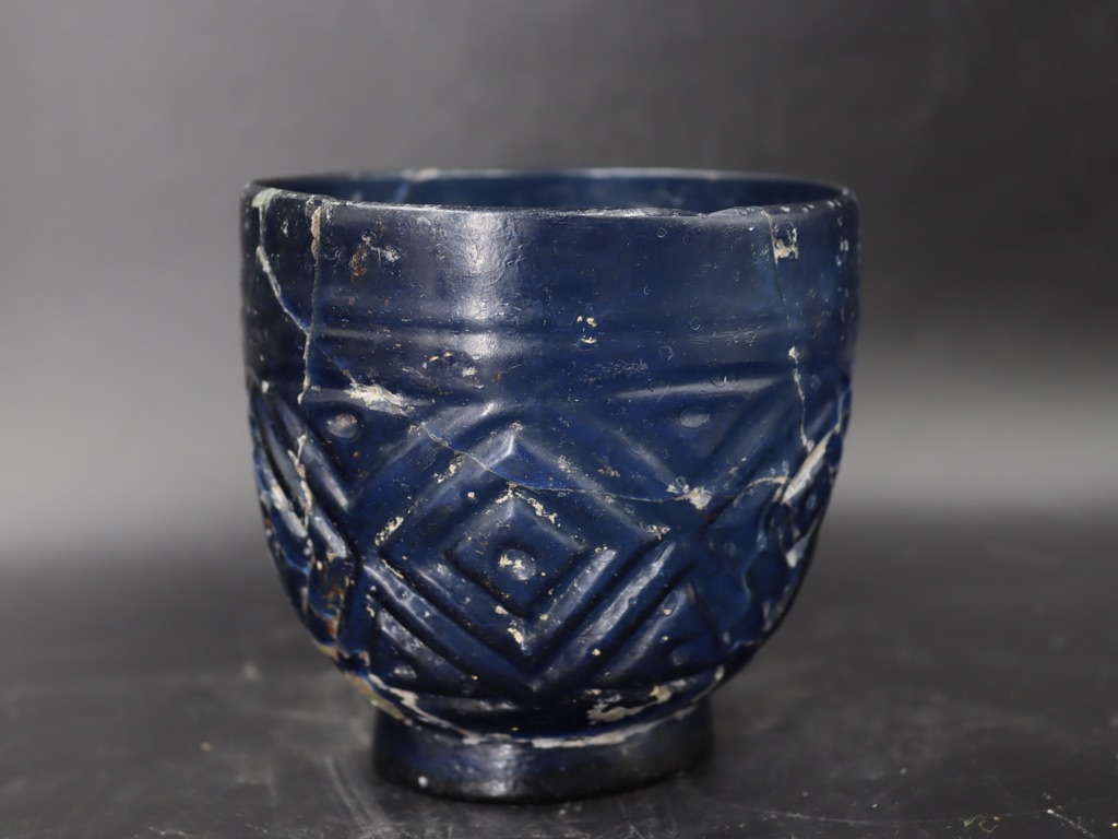 A Sasanian linear-cut blue glass bowl, 11th/12th CenturyA Sasanian linear-cut blue glass bowl, - Image 4 of 7