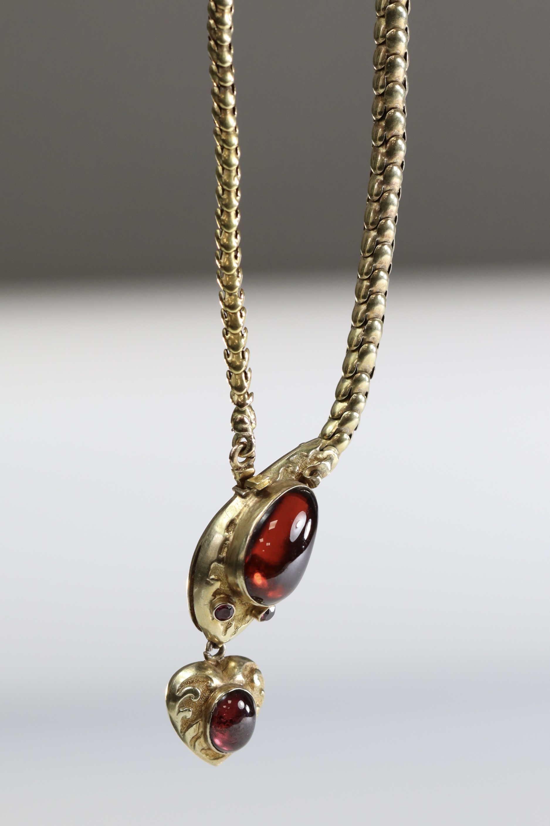 An attractive Antique Cabochon Garnet and Yellow Gold Snake Pendant, circa 1870,the head formed from - Image 10 of 13