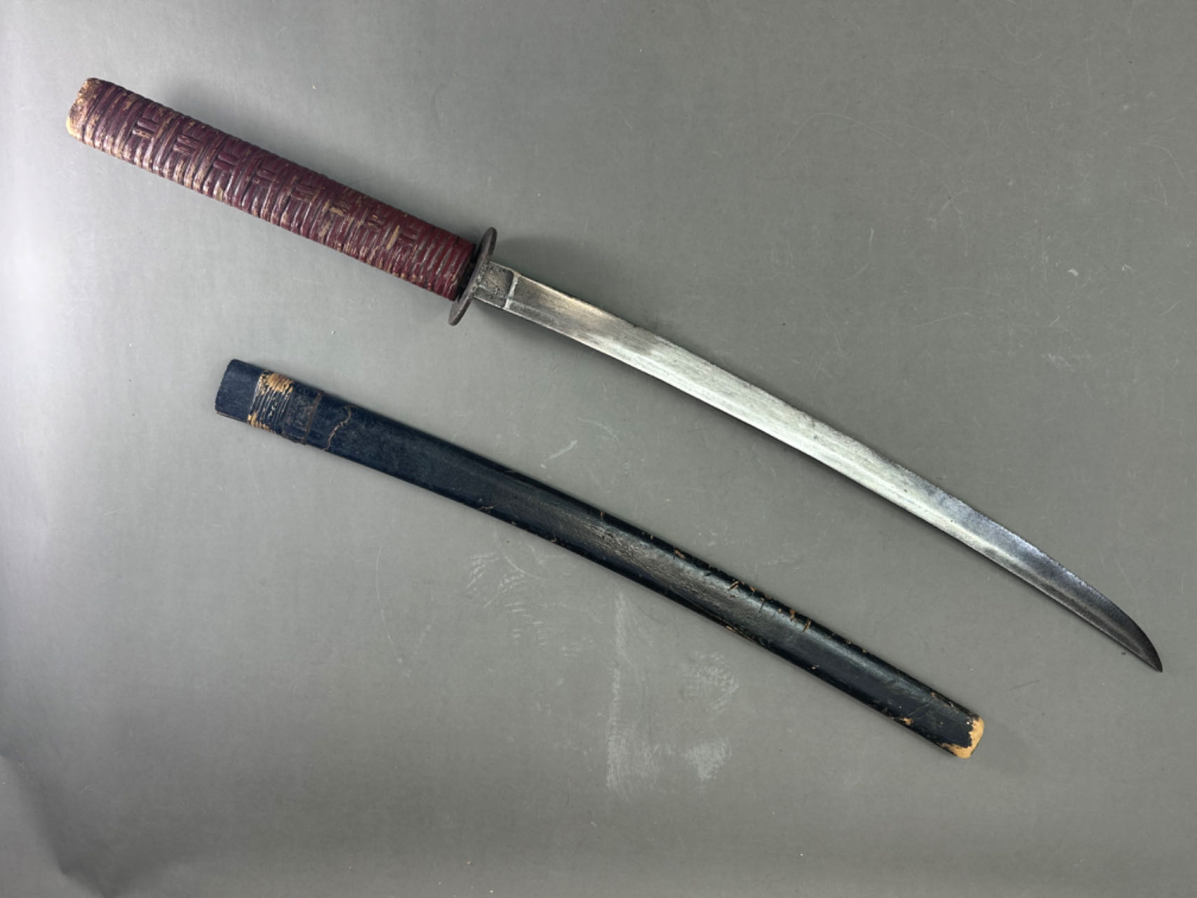 A Japanese Katana and Sheath, 19th/20th century.With basketwork hilt and wood sheath. L:88cm Good - Image 10 of 13