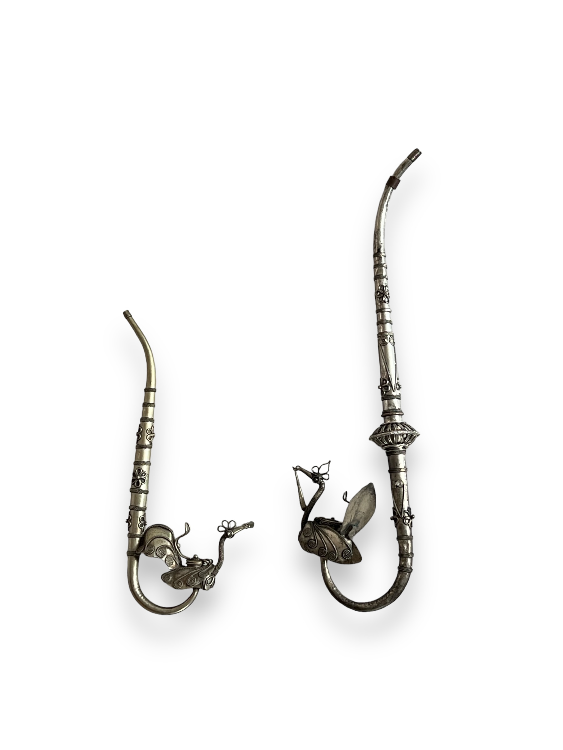 Two Phoenix shaped white metal Pipes, possibly Ottoman