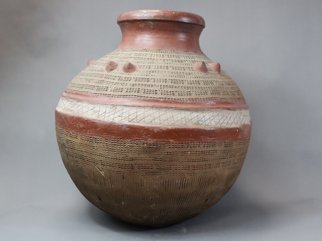 A large Nigerian vesselpottery, spherical with five pairs of mounds to the shoulders and with - Image 5 of 7