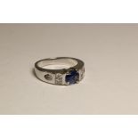 A Sapphire and Diamond Dress Ring, Circa 1990 A Sapphire and Diamond Dress Ring, Circa 1990 The oval