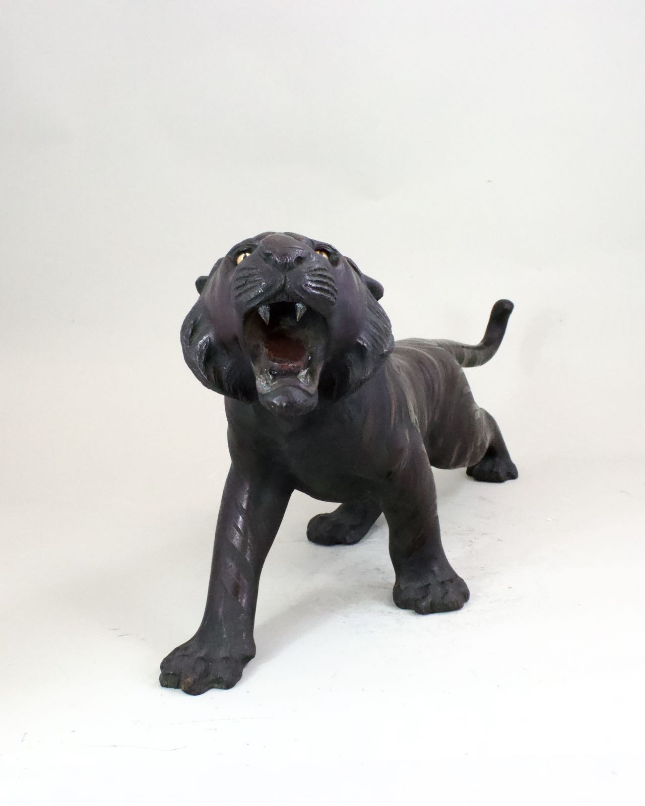 A Japanese Bronze Okimino of Tiger. Meiji Period.with glass eyes, and depicted snarling. Provenance: - Image 2 of 8