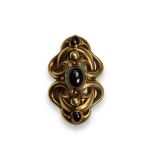 An Antique Cabochon Garnet and 18 ct Yellow Gold Brooch, circa 1860. Set with three graduated