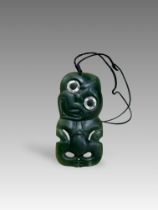 A Hei Tiki 'pounamu' Jade Carving. New Zealand.A fine and large New Zealand 'pounamu' jade,