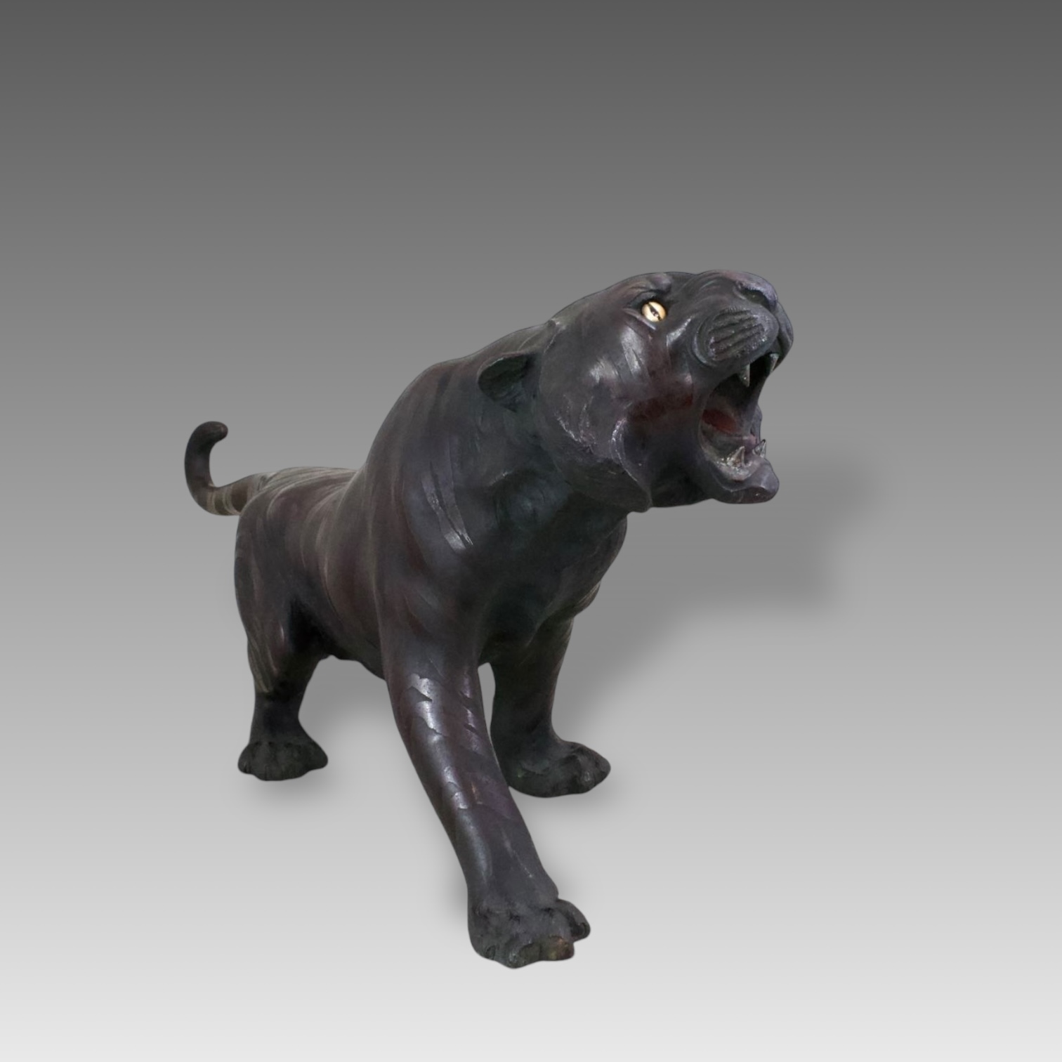 A Japanese Bronze Okimino of Tiger. Meiji Period.with glass eyes, and depicted snarling. Provenance: