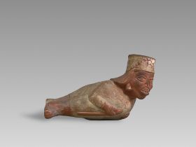 A Moche Culture Figure Figure with Cleft Lip Vessel. Peru ca. 100-700 AD.The terracotta vessel