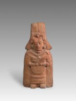 A Mayan Classic Period Priest Figurine. Maya lands. ca. 600-900 AD.The very fine pottery figurine