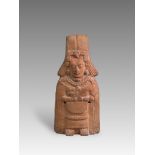 A Mayan Classic Period Priest Figurine. Maya lands. ca. 600-900 AD.The very fine pottery figurine