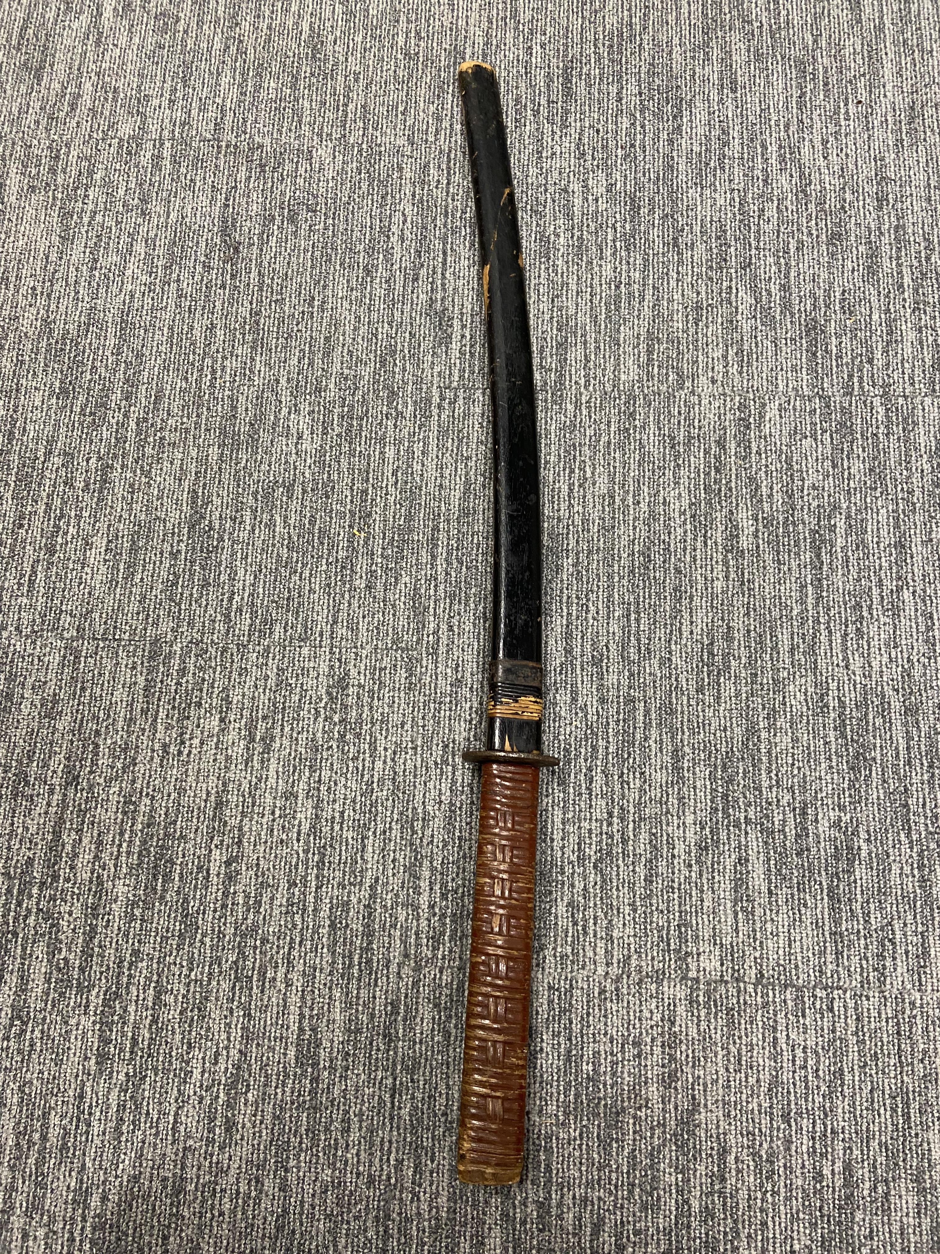 A Japanese Katana and Sheath, 19th/20th century.With basketwork hilt and wood sheath. L:88cm Good - Image 3 of 13