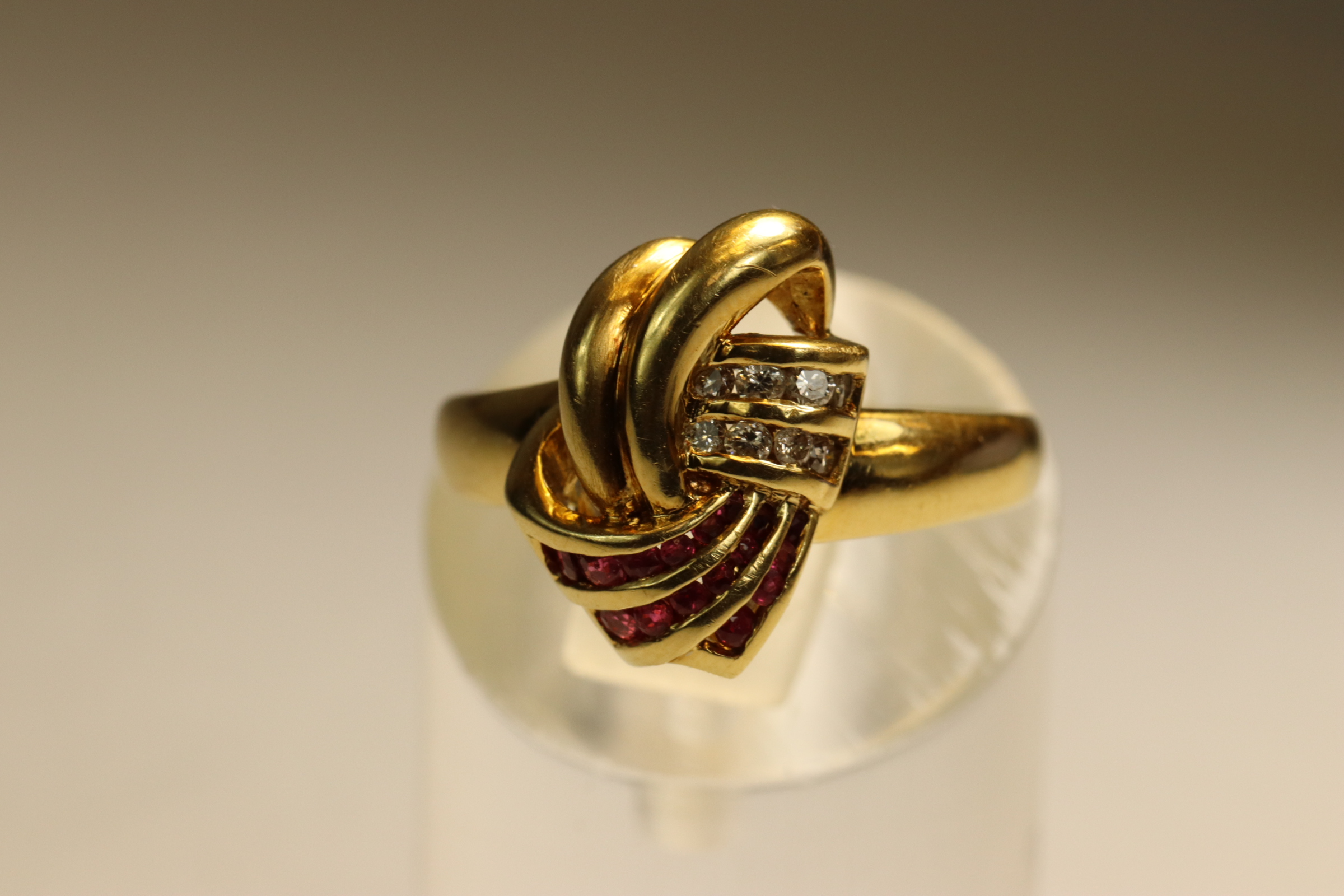 A 18 ct Gold, Ruby and Diamond Dress Ring, Of stylised scroll design, set with small rubies and - Image 4 of 4