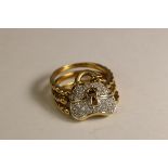 A Diamond and18 ct Gold set Padlock and Key Dress Ring, circa 1990 The padlock pave set with