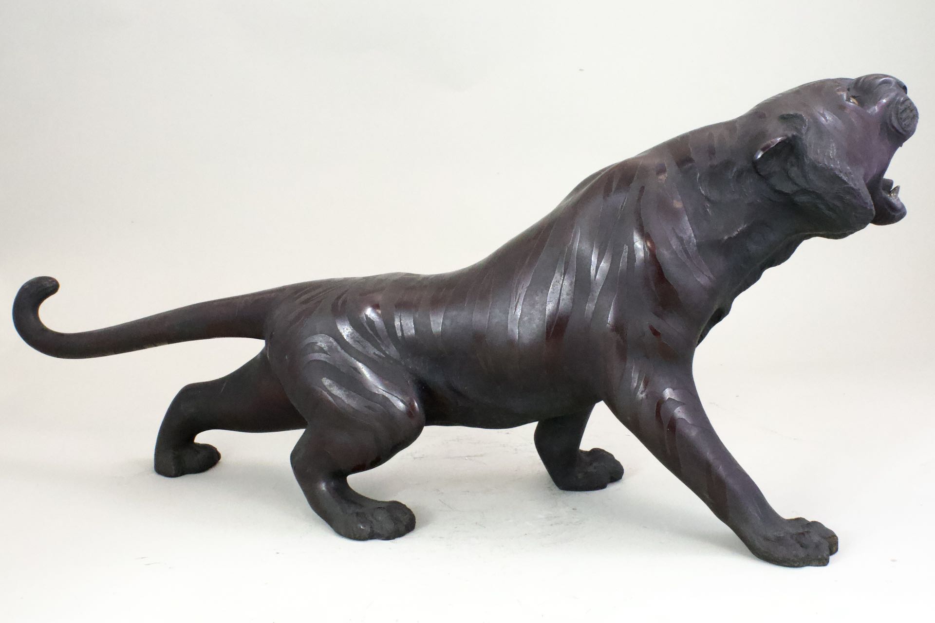 A Japanese Bronze Okimino of Tiger. Meiji Period.with glass eyes, and depicted snarling. Provenance: - Image 4 of 8