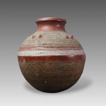 A large Nigerian vesselpottery, spherical with five pairs of mounds to the shoulders and with
