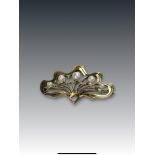 A Natural Pearl and Yellow Gold Brooch, circa 1910 of Art Nouveau style set with five graduated