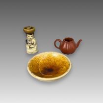 Three Ceramic Pieces, 19th century and earliercomprising a miniature Yixing teapot, an amber
