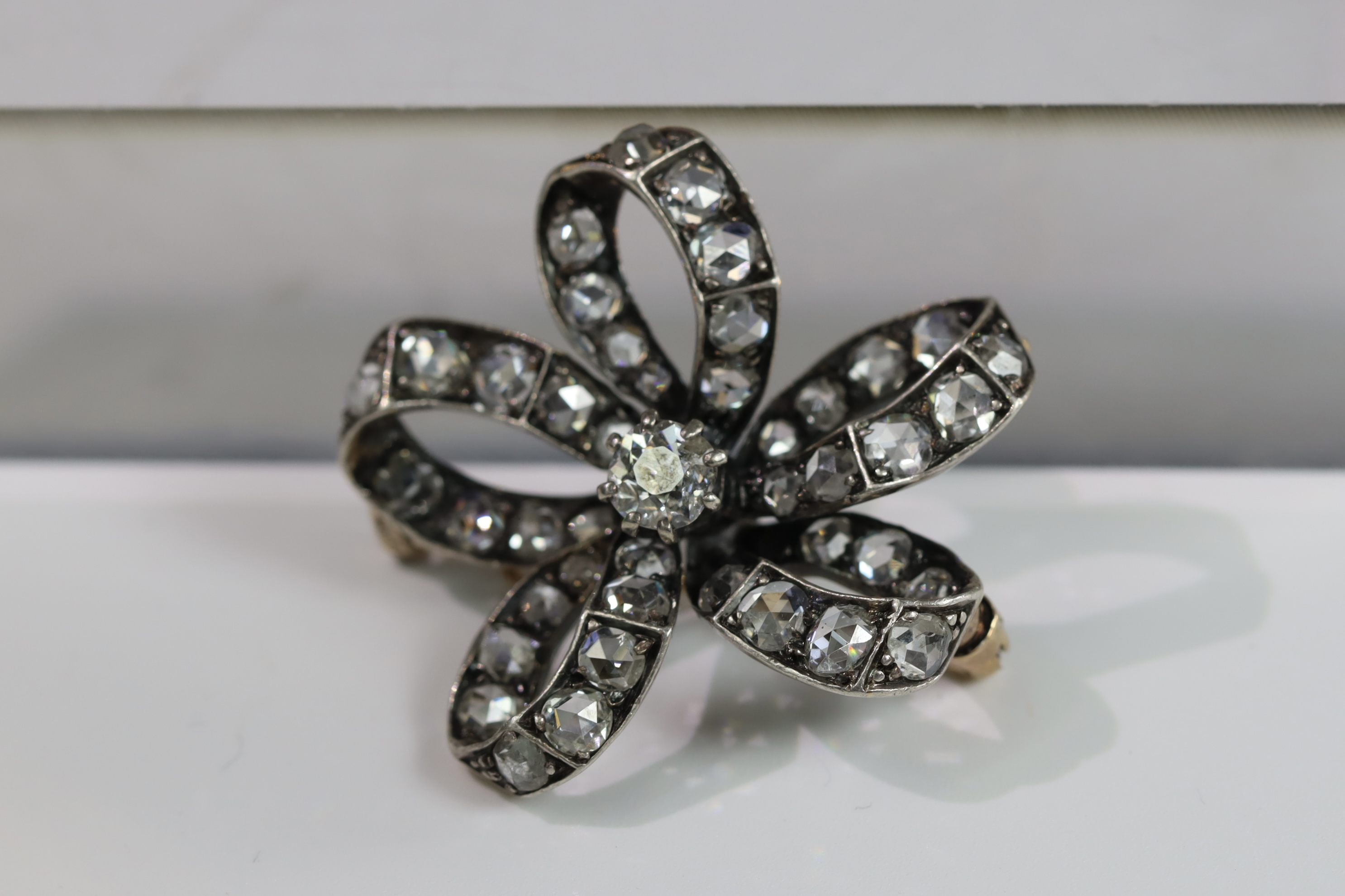 An Antique Diamond and a rose-cut Diamond Stylised Bow Brooch, circa 1890, centrally set with a - Image 6 of 13