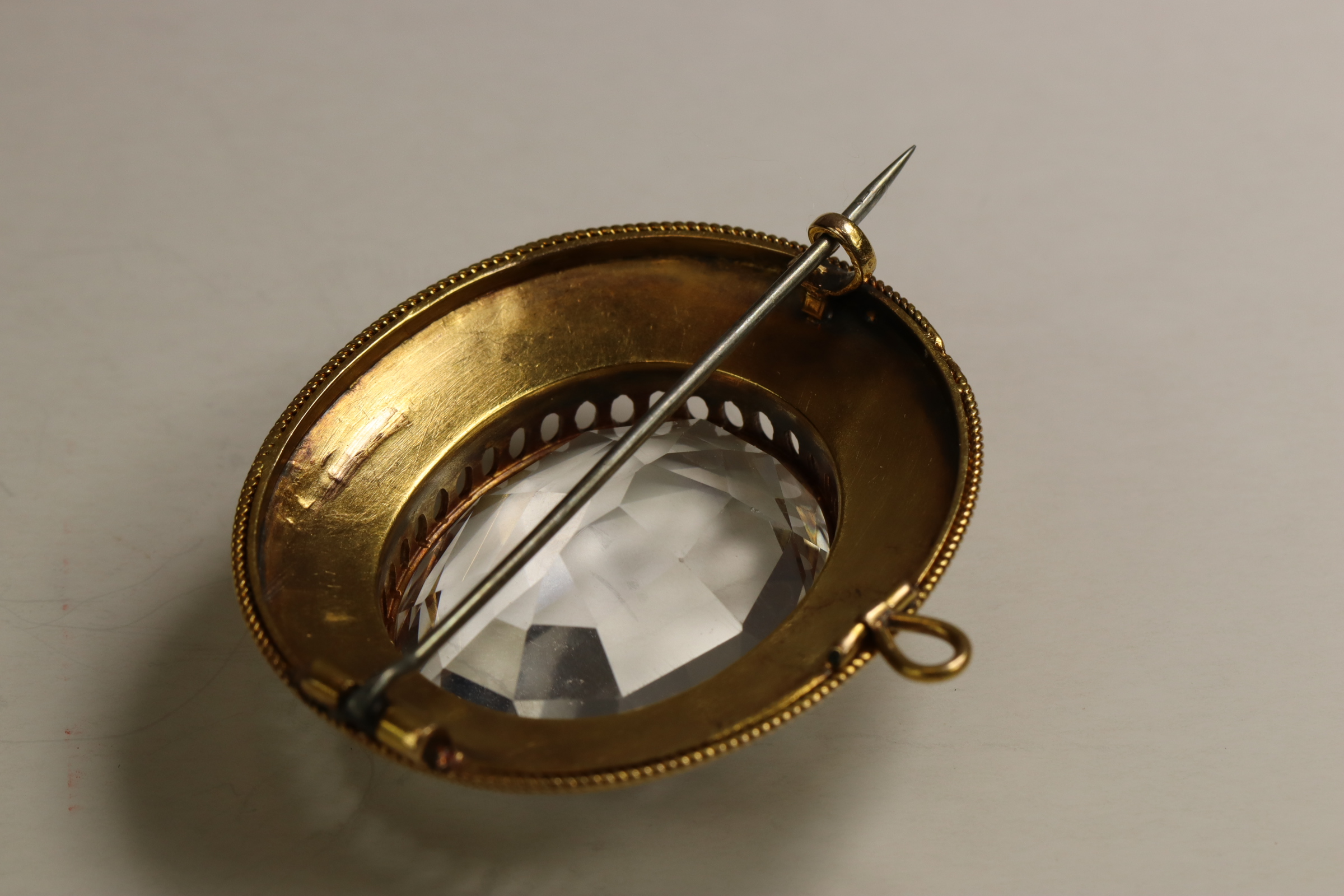 A Victorian 15/18 ct Yellow Gold and Rock Crystal Brooch, circa 1870 The large oval mixed-cut - Image 5 of 7