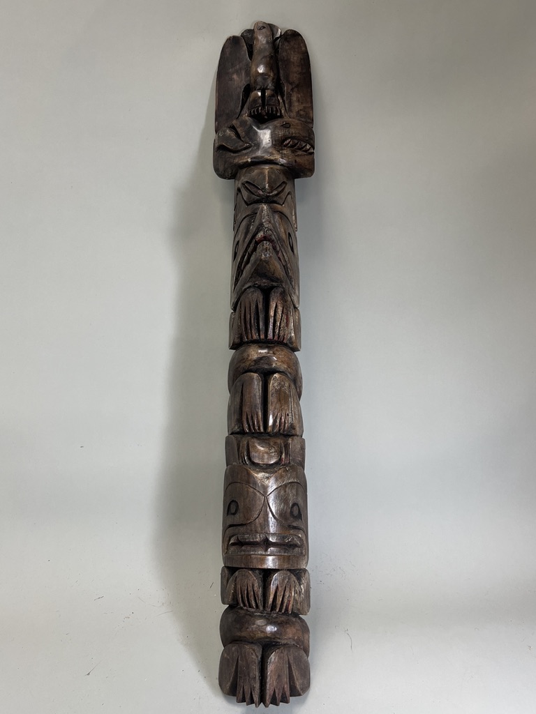 A model totem pole. Northwest Coast Canada.Carved in wood with a stacked arrangement of totemic - Image 2 of 7
