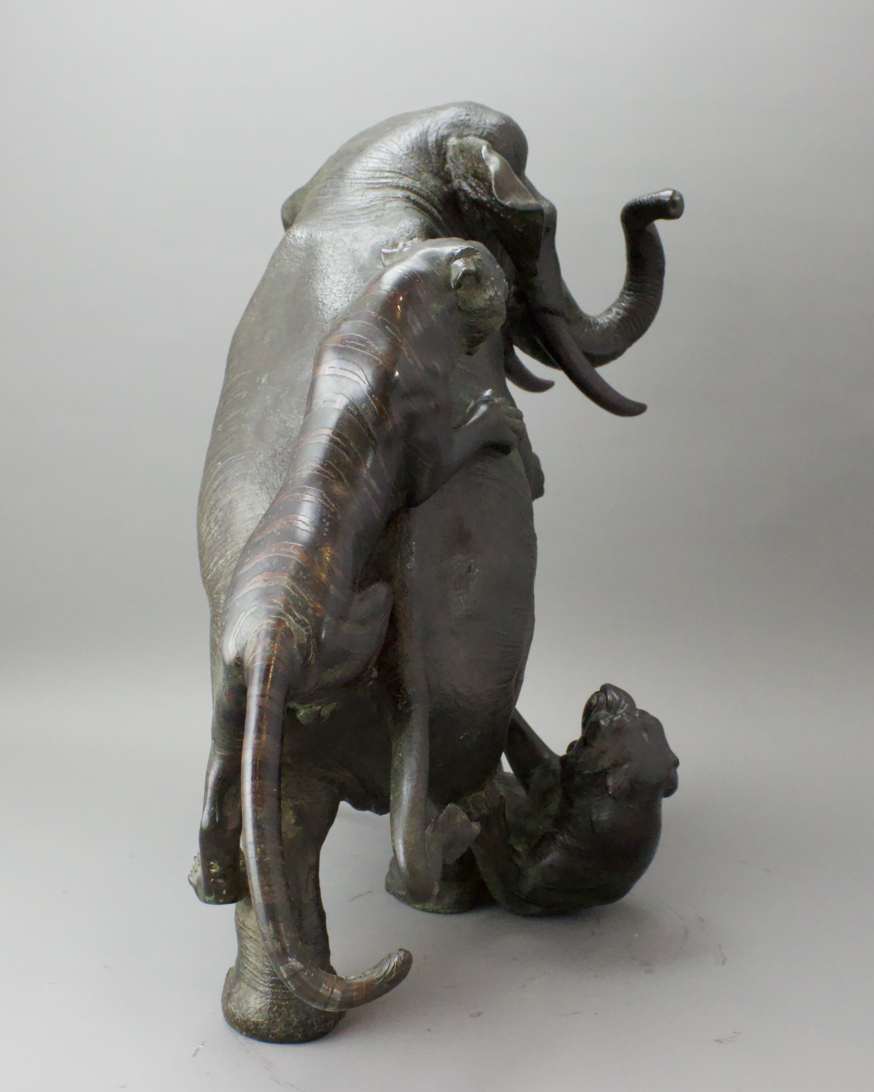 A Japanese Bronze Elephant and Tigers Group, Meiji period,with one seal, the enraged elephant in - Image 5 of 14