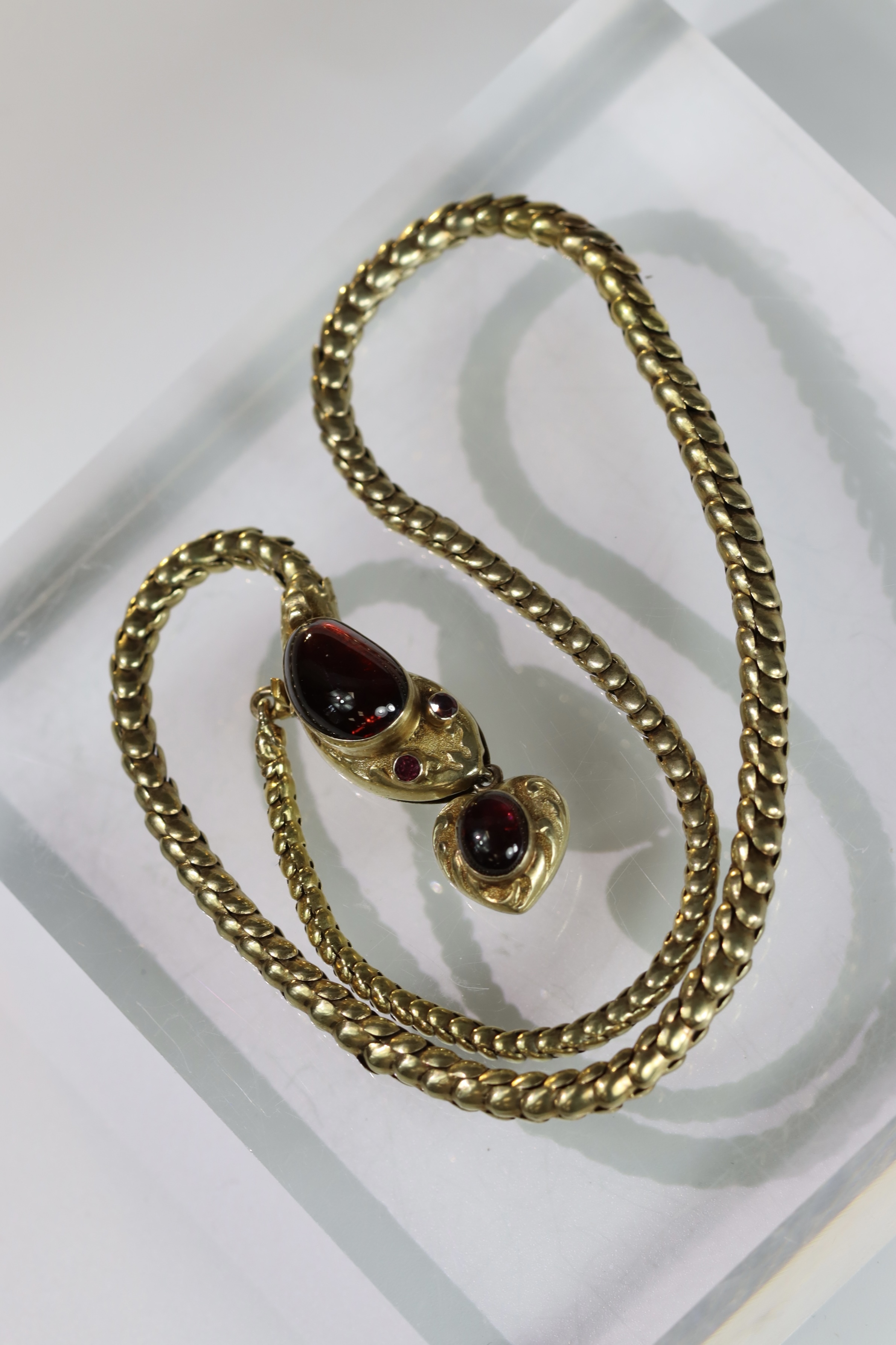 An attractive Antique Cabochon Garnet and Yellow Gold Snake Pendant, circa 1870,the head formed from - Image 11 of 13